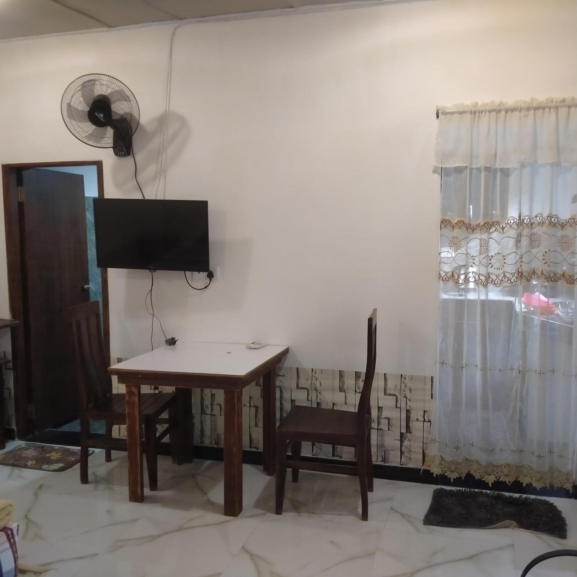 Living Home Negombo Quarto foto