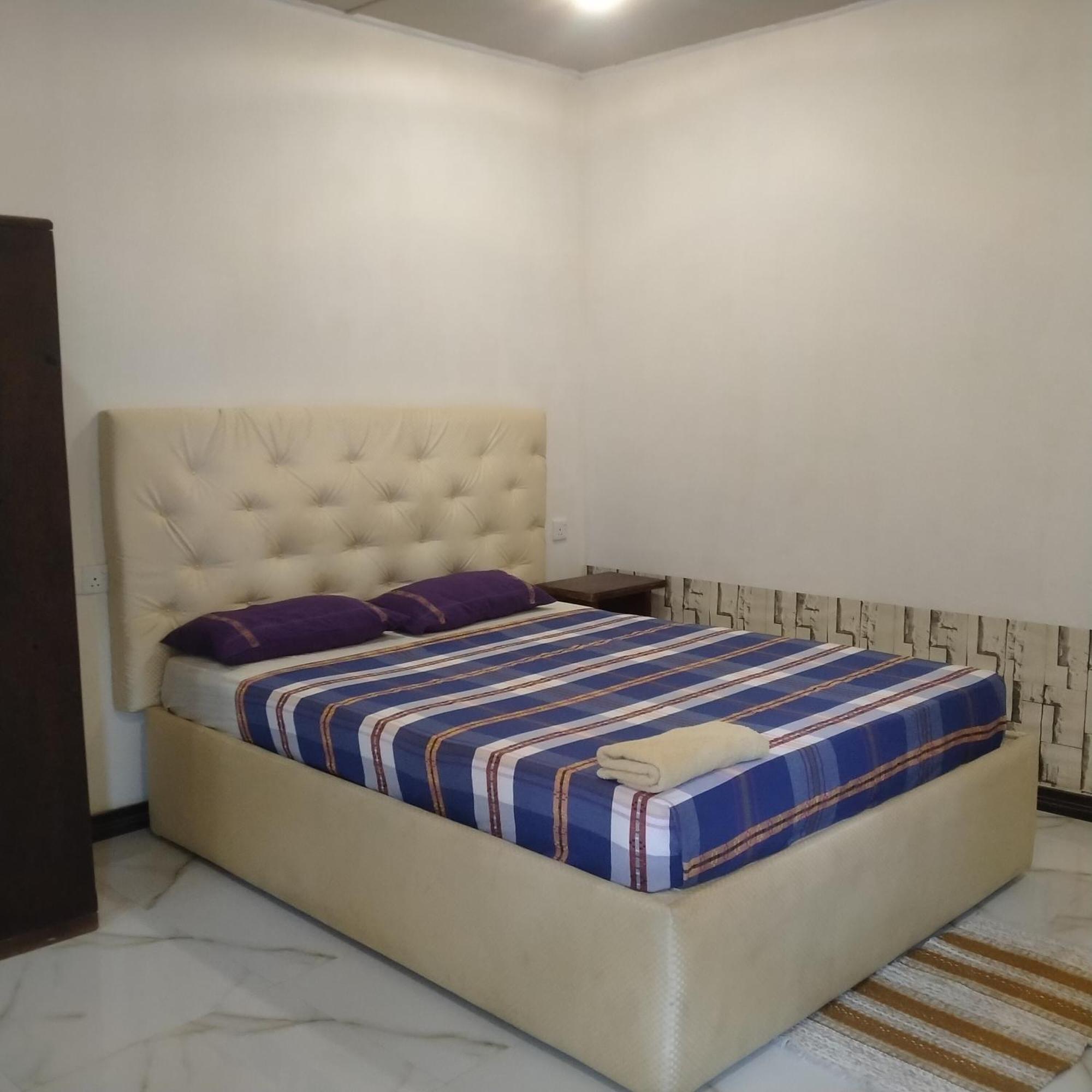 Living Home Negombo Quarto foto
